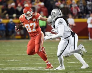 Tight end Travis Kelce races for extra yards during the team's 21-13 win over the Oakland Raiders at Arrowhead Stadium Dec. 8, 2016. (Photo by Mike Gunnoe, The Topeka Capital-Journal)