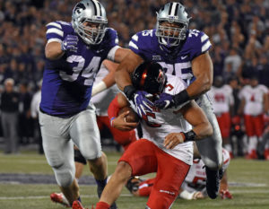 Kansas State defensive end Jordan Willis makes a play on Texas Tech quarterback and Chiefs first-round draft pick Patrick Mahomes.